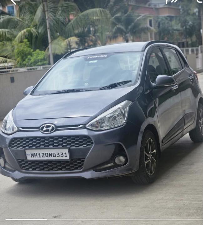 Grey Hyundai Grand i10 diesel self drive car on rent in Ravet